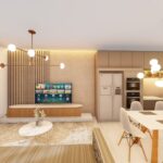 Cozinha funcional conectada à sala de estar, com acabamentos modernos.