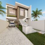 Vista lateral da casa, evidenciando o acesso à garagem espaçosa e a continuidade do jardim