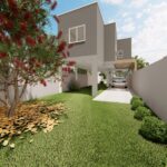 Conta com um jardim bem cuidado e uma ampla garagem, ideal para veículos de grande porte.